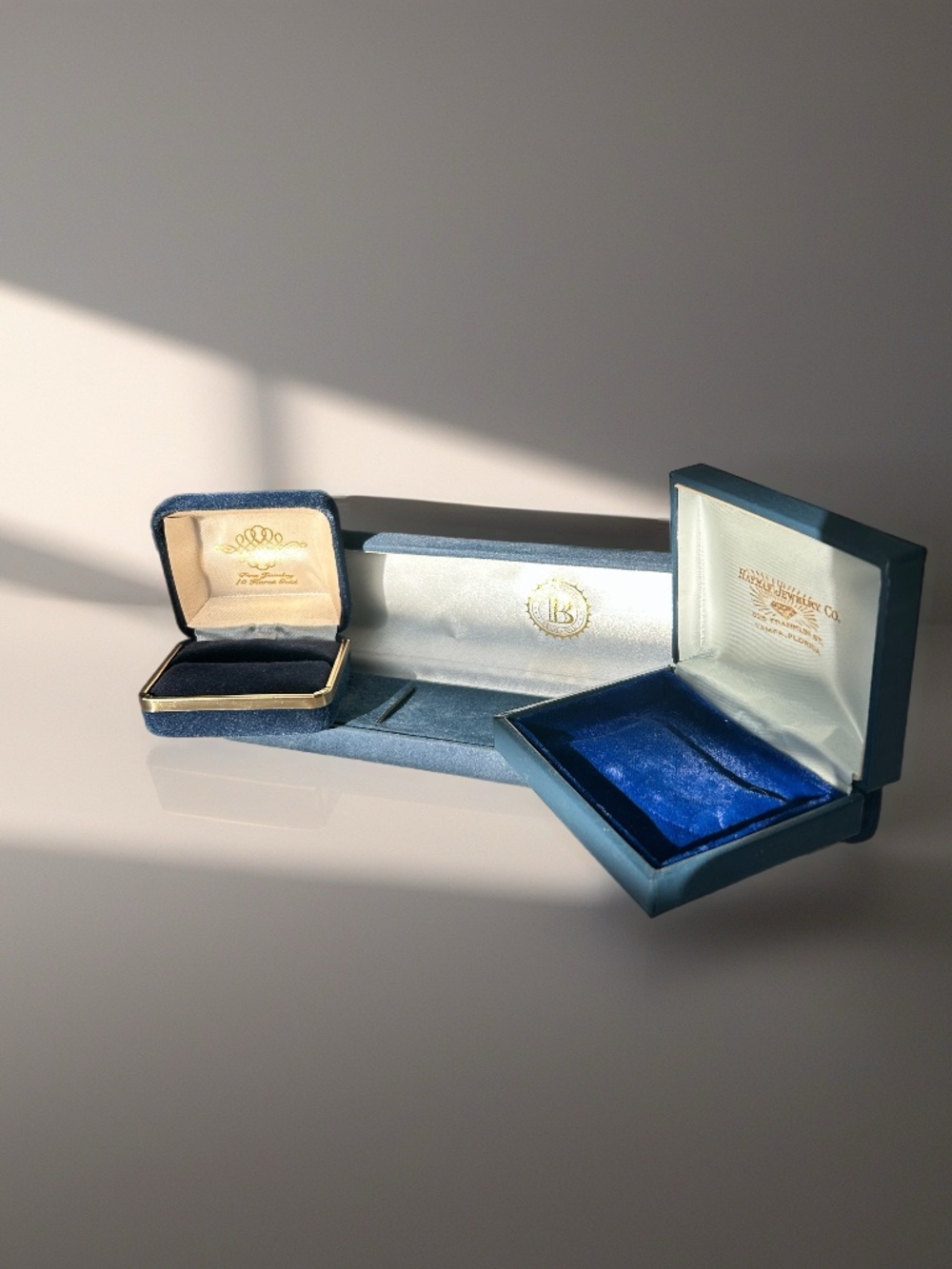 Three Vintage, Blue Velvet and Leather Jewelry Presentation Boxes